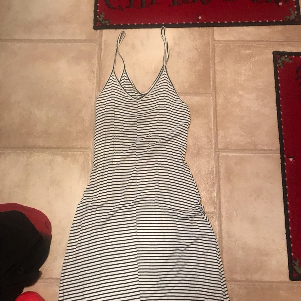 Cute summer dress I wore once for a graduation form fitting hits below the knee